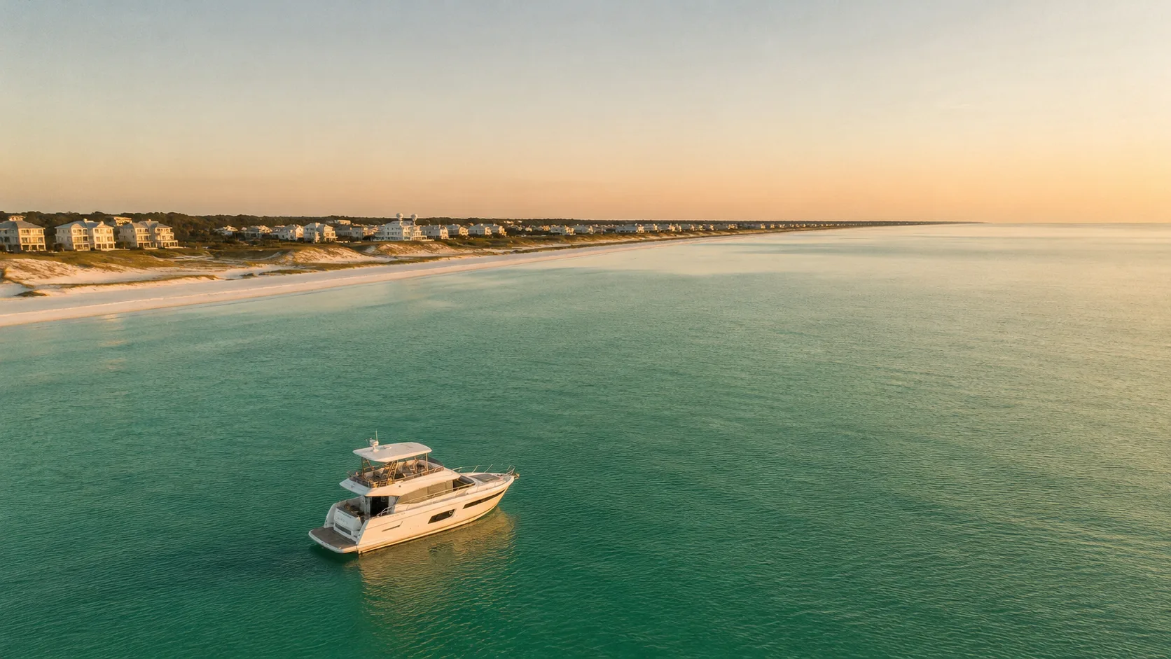 Aerial view of a private yacht charter anchored along the Seaside, Florida coastline